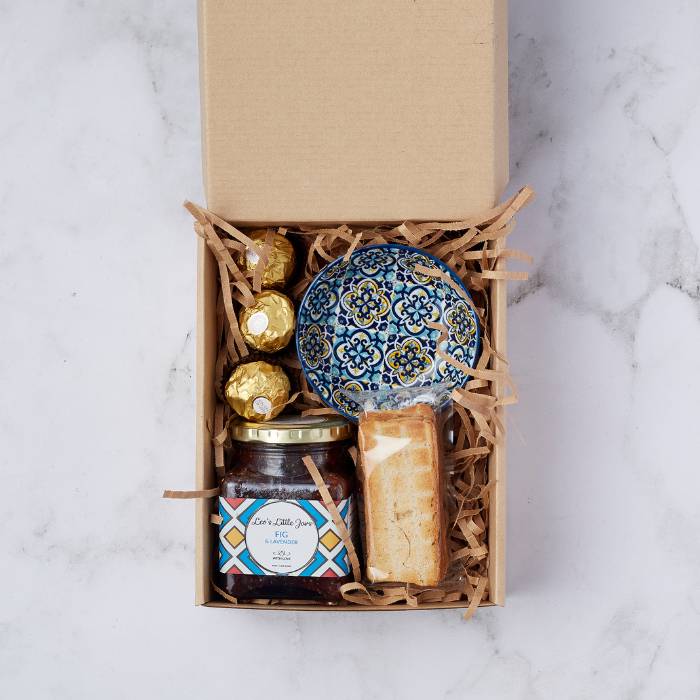 Fig & Lavender Delight Gift Box with preserve, Ferrero Rocher, artisan ceramic bowl, and toasts in elegant packaging.