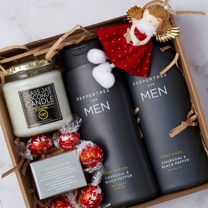 Gentleman's Christmas Care Set with Peppertree body wash, lotion, soap, glass jar candle, and Lindt chocolate truffles.