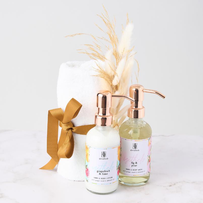 Indulge in luxury with Flower Guy’s Golden Touch Pamper Gift Set, featuring premium bath essentials and a plush towel. Perfect for relaxation.