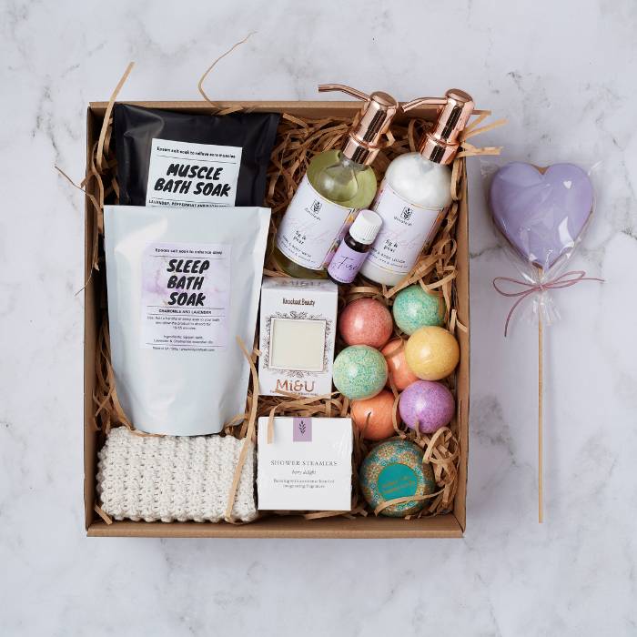 Lady of Leisure Bridesmaids Hamper with bath soaks, body wash, bath bombs, and shower steamers.