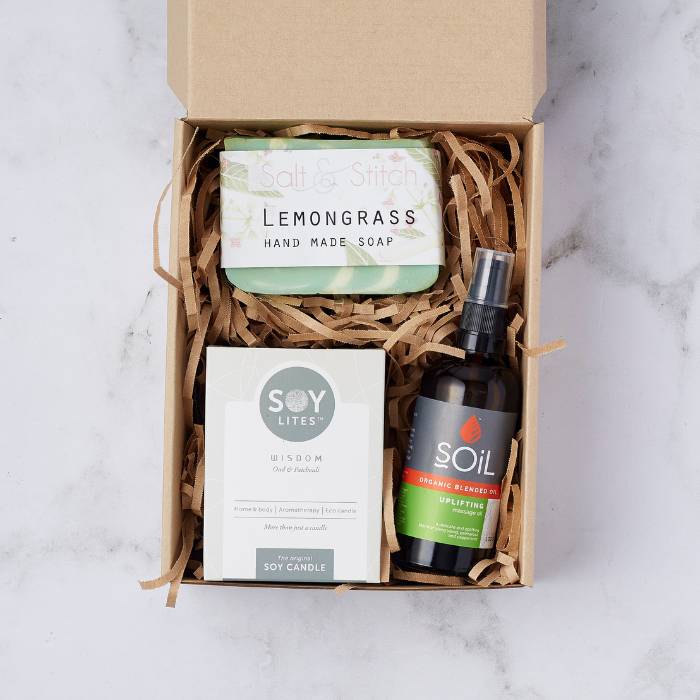 Lemongrass Serenity Gift Box with handmade soap, soy candle, and organic massage oil, displayed in eco-friendly packaging.