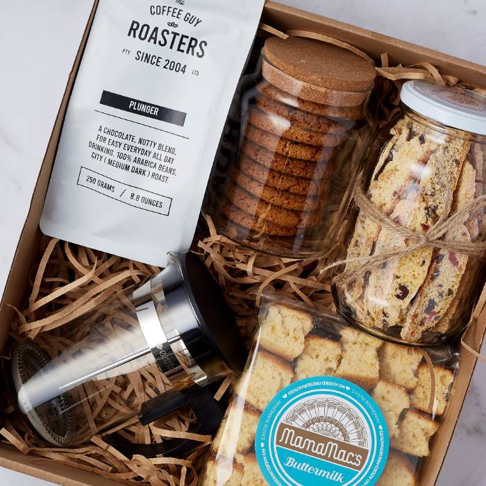 Close-up of the Premier Coffee Gift Box showing coffee, cookies, biscotti, and rusks presented with care and sophistication.