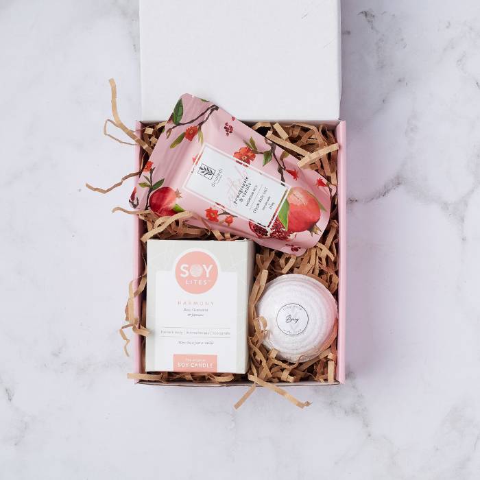 Tickle My Fancy Gift Box featuring a Soy Lites Harmony Candle, Pomegranate & Vanilla Epsom Bath Salt, and a Fragrance Bath Bomb, beautifully arranged in eco-friendly packaging.